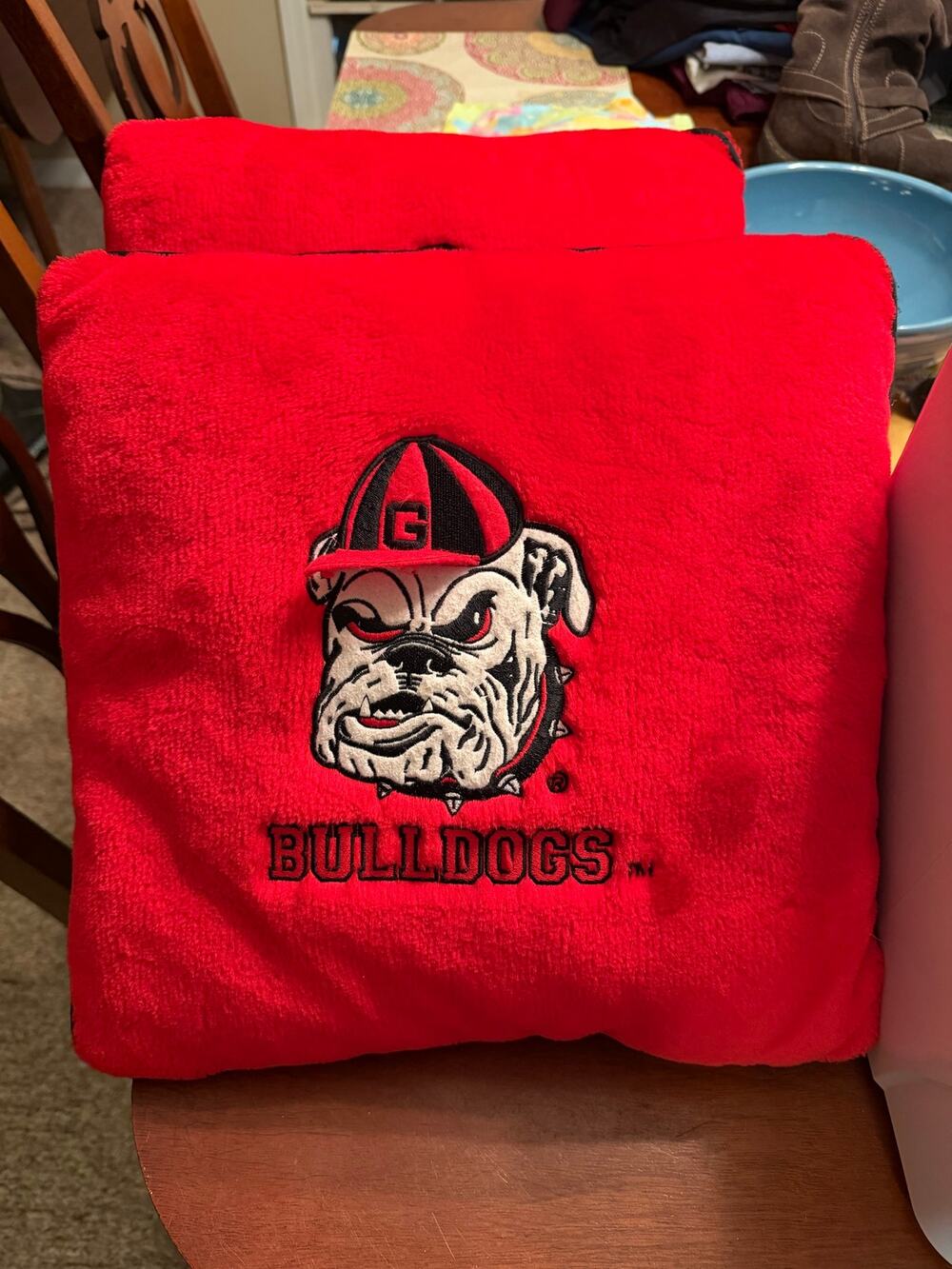 Two plush University of George pillows